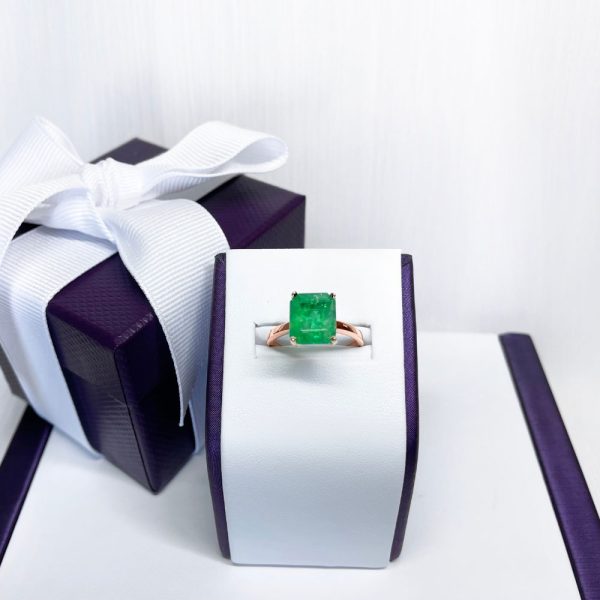 Shiny 18K Rose Gold Ring Emerald Cut Design